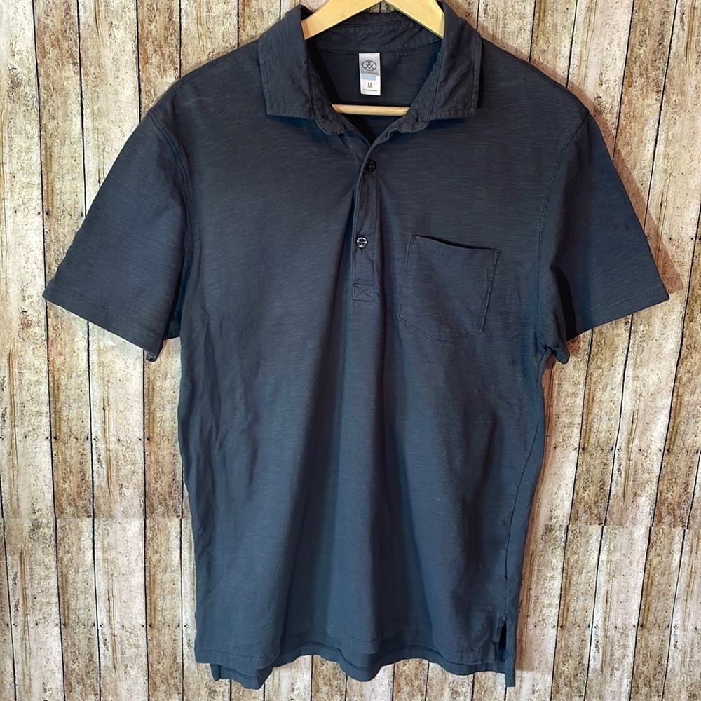 Medium polo with pocket. Grey. Like new.